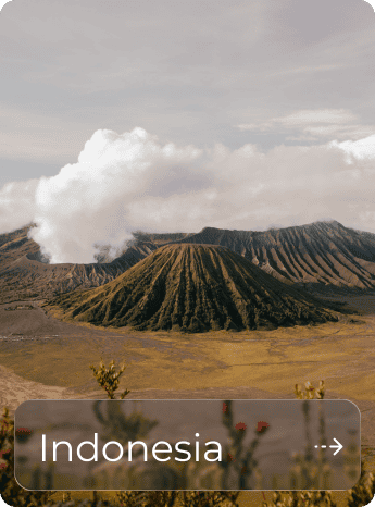Active volcano erupting with ash and smoke in Indonesia.