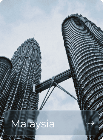 View of the Petronas Towers in Kuala Lumpur, Malaysia, from below.
