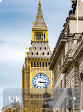 Close-up of Big Ben clock tower in London with clear blue sky.